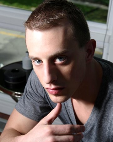 Calvin strokes his huge cock